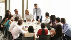 team of people around a table