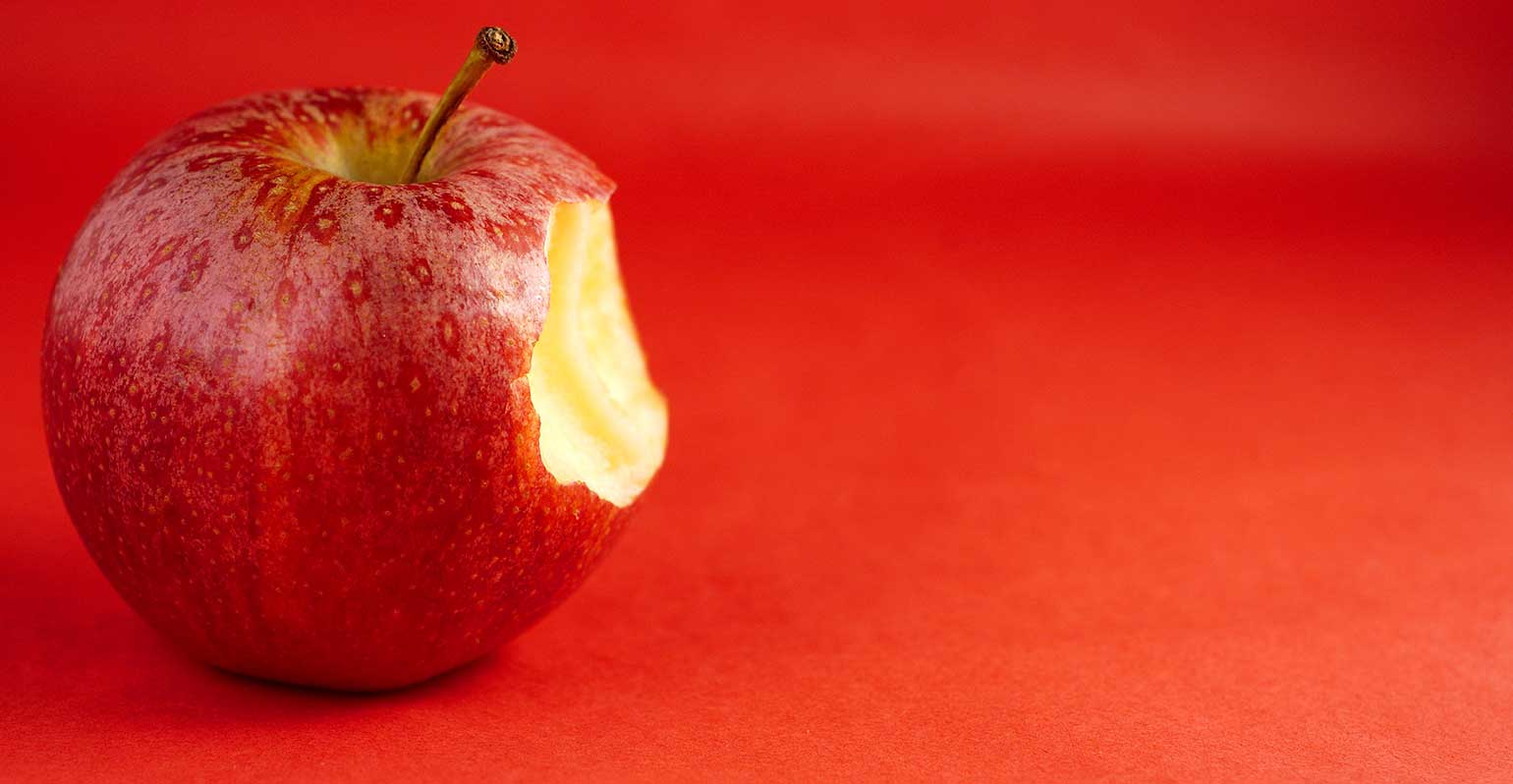 Red apple with a bite taken out