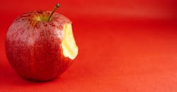 Red apple with a bite taken out Red apple with a bite taken out