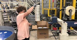 worker packing at Intertape Polymer Group worker packing at Intertape Polymer Group