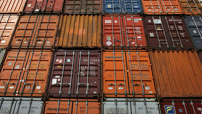 A wall of shipping containers.
