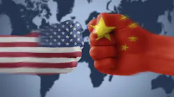 American flag colliding with Chinese flag painted on fists