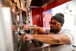 Industryweek Com Sites Industryweek com Files Ford Leron Jones Additive Manufacturing Technician Works On One Of The 23 3 D Printers Low Res Industryweek Com Sites Industryweek com Files Ford Leron Jones Additive Manufacturing Technician Works On One Of The 23 3 D Printers Low Res