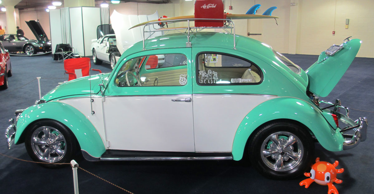 In the ldquosomethingforeveryonerdquo category is this clean twotone rsquo64 Bug owned by Michael Hartley Completing it is a roof rack for luggage some seemingly undersized surfboards and an ice cooler that reminds me of the one my dad used to lug around until we were big enough to barely handle it