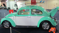 In the ldquosomethingforeveryonerdquo category is this clean twotone rsquo64 Bug owned by Michael Hartley Completing it is a roof rack for luggage some seemingly undersized surfboards and an ice cooler that reminds me of the one my dad used to lug around until we were big enough to barely handle it
