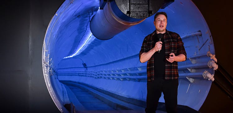 Elon Musk, co-founder and CEO of Tesla Inc., speaks at an unveiling event for The Boring Company Hawthorne test tunnel December 18, 2018, in Hawthorne, California.