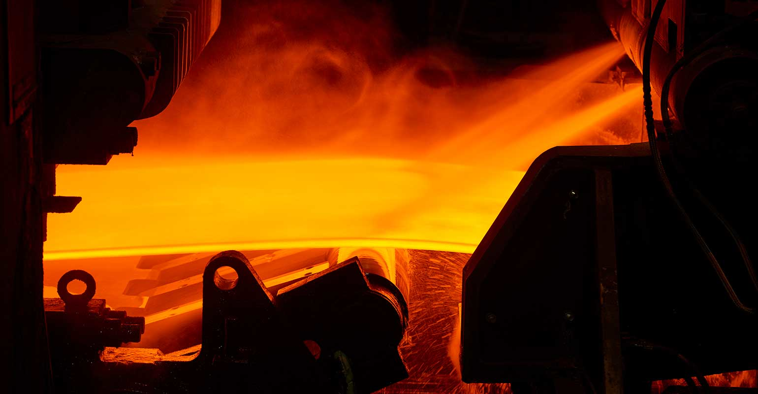 hot-slab-steel-being-rolled-roger-ball-worldsteel-getty-images.jpg