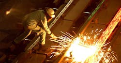 Industryweek 35954 Steel Worker Cuts Billet Sparks David Mcnew Staff Getty Images