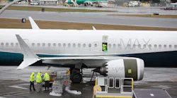 boeing-737-max-parked-with-workers-JASON-REDMOND-AFP-Getty.jpg