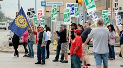 UAW members picket at GM site in Flint, MI, Monday, Sept. 16, 2019.