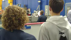 Benedictine-students-observe-SKF-worker.jpg