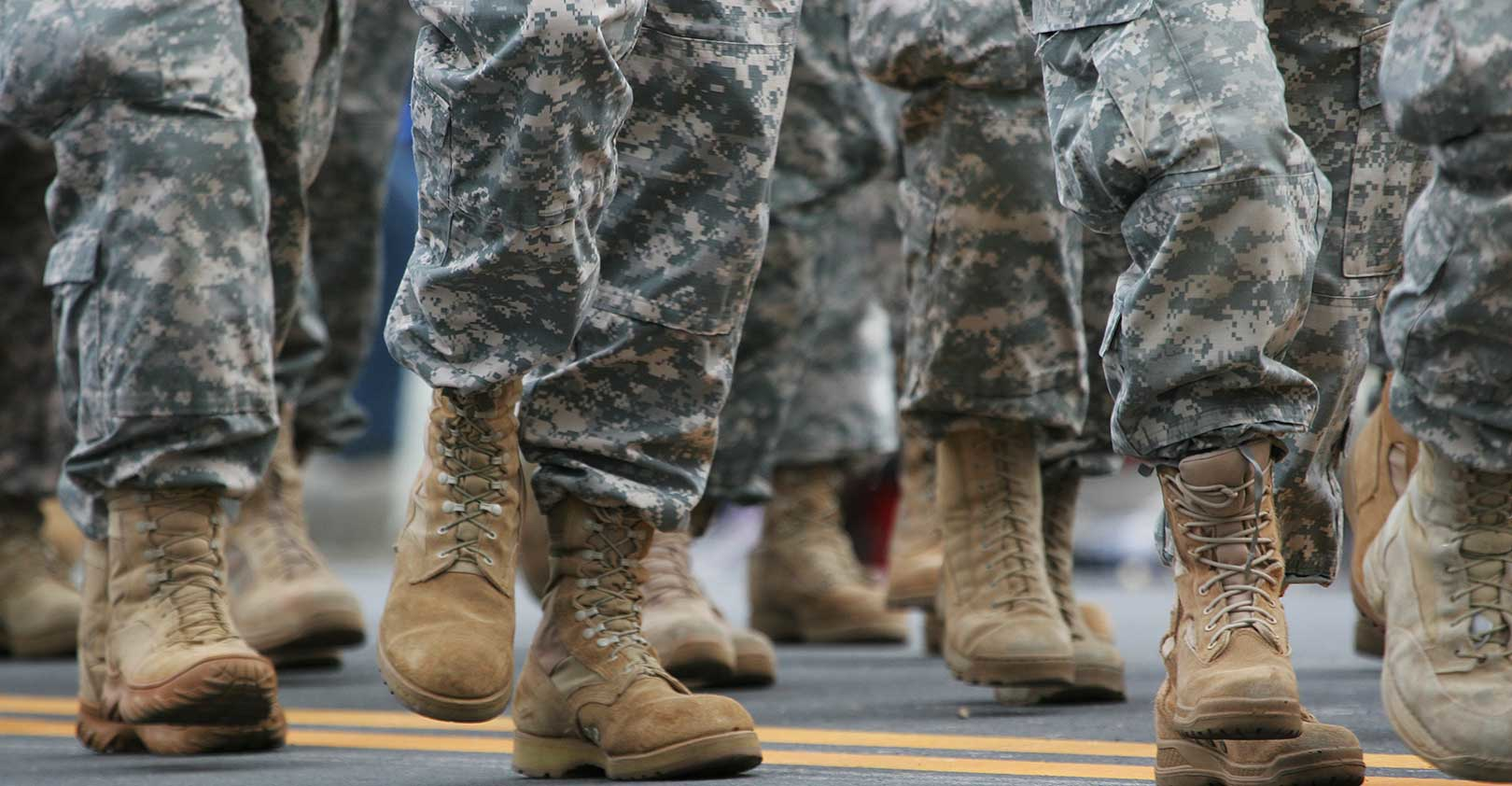 soldiers-military-marching-boots-camo-flySnow-istock-getty.jpg