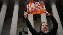 exxon-mobil-climate-protestor-nyc-supreme-court-drew-angerer-getty.jpg