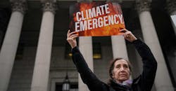 exxon-mobil-climate-protestor-nyc-supreme-court-drew-angerer-getty.jpg exxon-mobil-climate-protestor-nyc-supreme-court-drew-angerer-getty.jpg