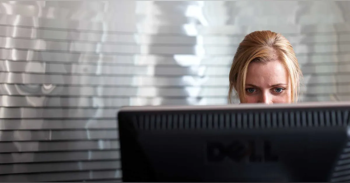 Lady Using Dell Computer Dell Aims to Make Women Half of Workforce in Diversity Push | IndustryWeek