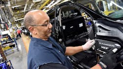Ford employee Duane Moore puts the finishing touches on a Ranger at the (Wayne) Michigan Assembly plant. Ford employee Duane Moore puts the finishing touches on a Ranger at the (Wayne) Michigan Assembly plant.
