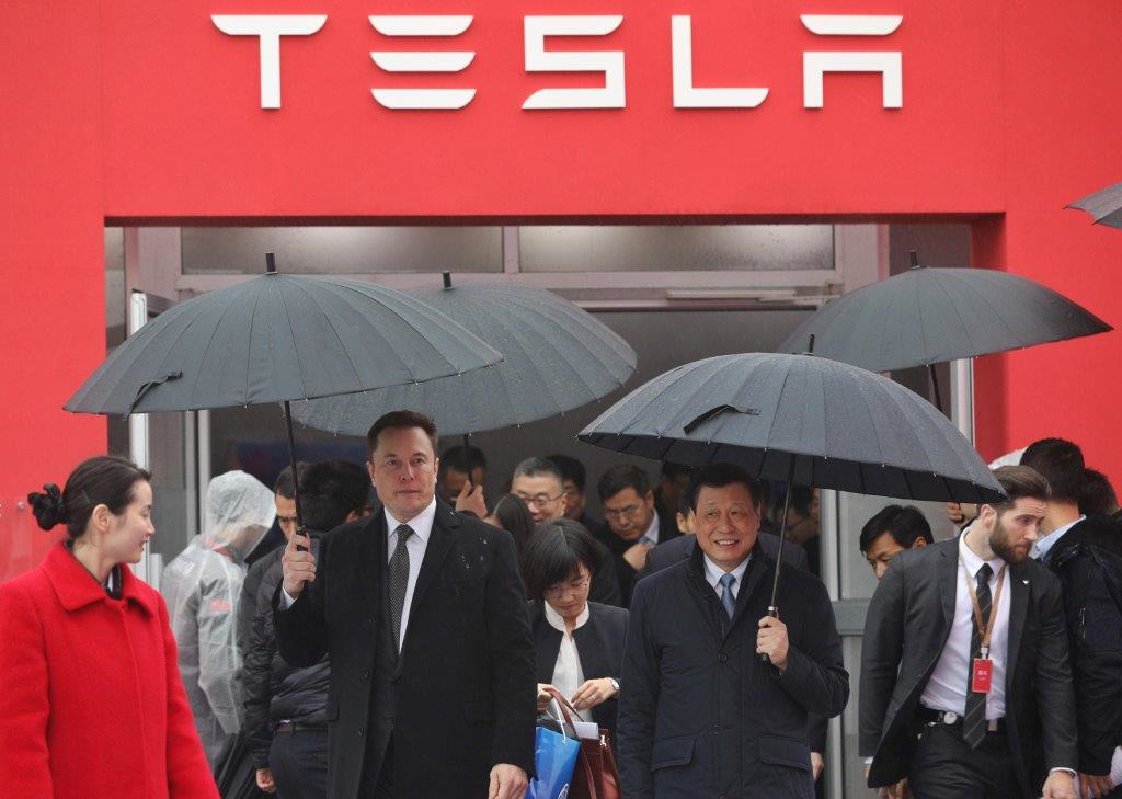 Elon Musk walks with Shanghai Mayor Ying Yong during the ground-breaking ceremony for a Tesla factory in Shanghai on January 7, 2019.