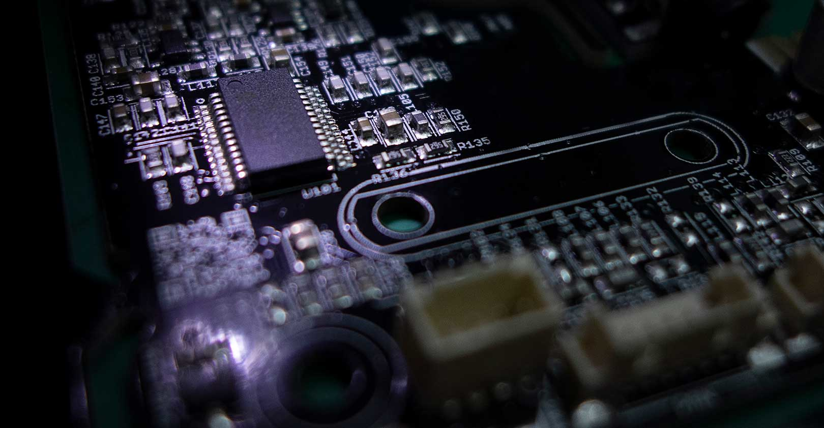 silicon-integrated-circuit-computer-chip-dark-istock-getty.jpg