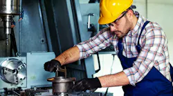 worker-using-CNC-milling-machine-workshop-istock-getty.jpg