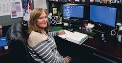 Jo Stanton of T&S Brass and Bronze Works seat at a desk Jo Stanton of T&S Brass and Bronze Works seat at a desk