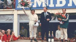 Bruce McLaren, Henry Ford II and Chris Amon on the victory rostrum at 24 Hours of Le Mans 1966.