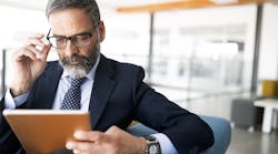 Executive Concerned Suit Man Glasses Beard Istock Getty