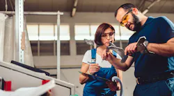 Worker Using Cnc Machine Training Supervisor Istock Getty