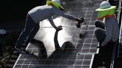 Solar Panel Workers Install Solar Panels On Roof Sunny Joe Raedle Getty