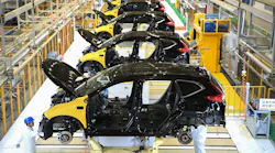 This photo taken on November 27, 2019 shows employees working on an assembly line at the third auto plant of Dongfeng Honda in Wuhan in China's central Hubei province.