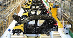 This photo taken on November 27, 2019 shows employees working on an assembly line at the third auto plant of Dongfeng Honda in Wuhan in China's central Hubei province. This photo taken on November 27, 2019 shows employees working on an assembly line at the third auto plant of Dongfeng Honda in Wuhan in China's central Hubei province.