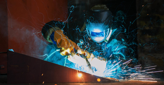 Worker Welding Metal Beautiful Sparks Istock Getty Images Plus 5e61b8f617f6a