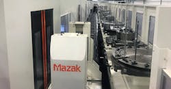 Automation is key to Polamer Precision's talent strategy. Here, a Palletech system runs parts through everything from machining to QA without human interaction, allowing just four operators to tend 11 different machines simultaneously. Automation is key to Polamer Precision's talent strategy. Here, a Palletech system runs parts through everything from machining to QA without human interaction, allowing just four operators to tend 11 different machines simultaneously.