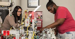 Students at the Tri-C Manufacturing Technology Center, located in Cleveland, are learning new collar skills. Students at the Tri-C Manufacturing Technology Center, located in Cleveland, are learning new collar skills.
