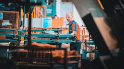Factory Worker Man Orange Cyan Vest Framed Photo By Sam Moqadam On Unsplash