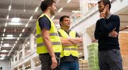 manager speaking with employees manager speaking with employees