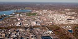 Photo: Dow’s headquarters in Midland, Michigan before the May 19, 2020 flood. The Tittabawasse River can be seen at left, in front of a brine pool. Photo: Dow’s headquarters in Midland, Michigan before the May 19, 2020 flood. The Tittabawasse River can be seen at left, in front of a brine pool.