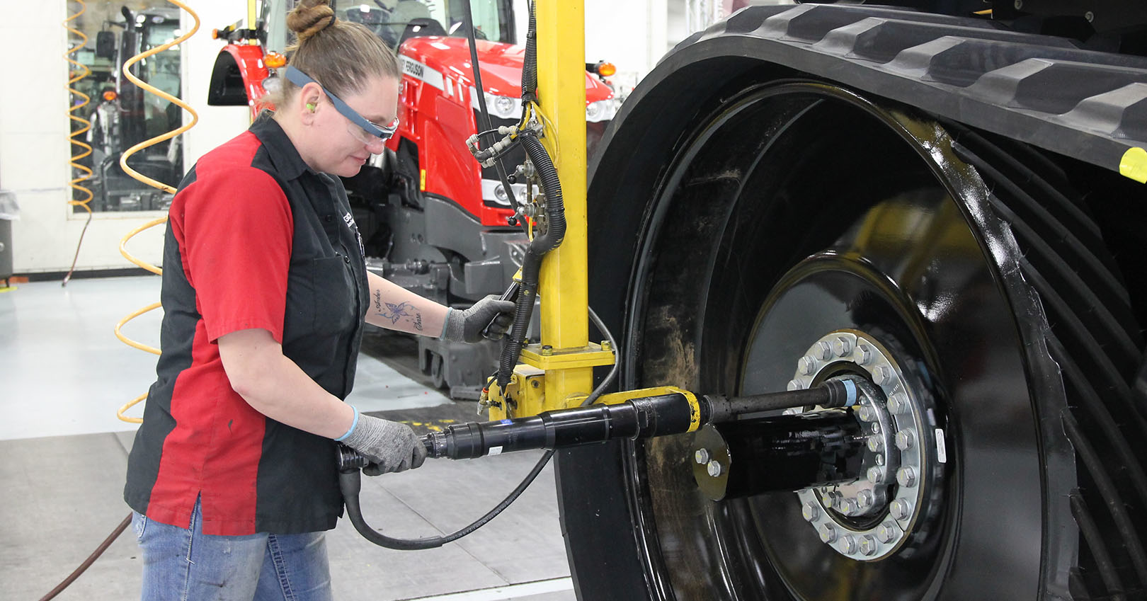 Agco Manufacturing Employee Working On Equipment