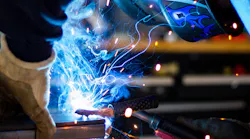 Welding Guy Blue Sparks Rob Lampert Unsplash