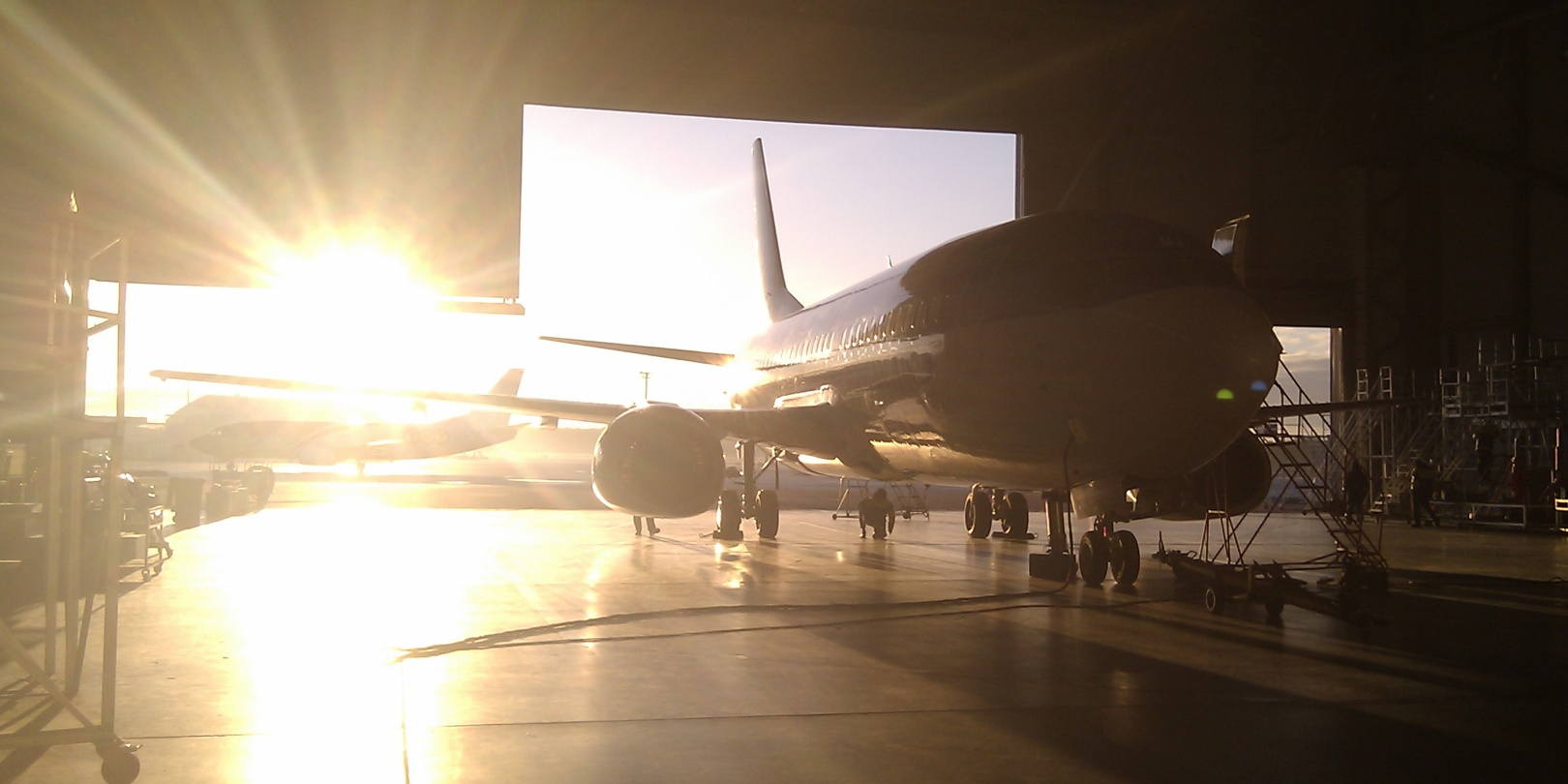 Boeing 737 Classic In Hangar Silhouette Sunlit Light Dark Contrast 80884155 Dreamstime 5f9a51fd8210d