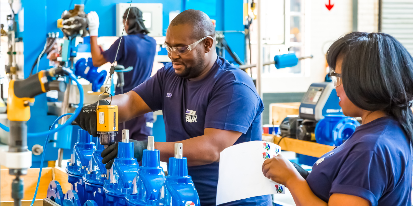 Black Engineers Factory Floor Valves Bright Blue Valves Manufacturing Michael Turner Dreamstime 5f88751838f90