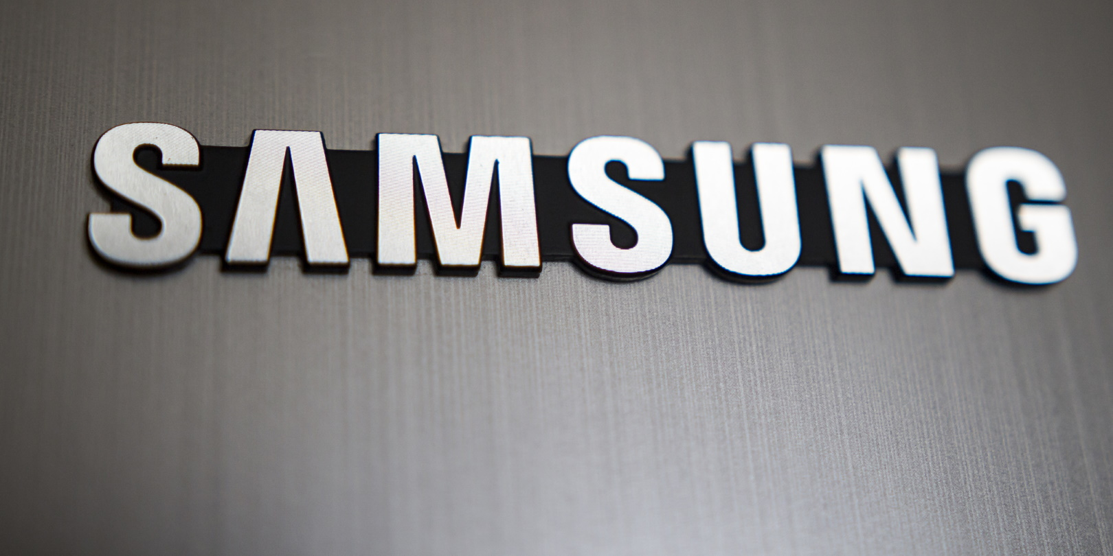 Samsung Logo On Brushed Steel Siarhei Dzmitryienka Dreamstime 5f966579dd89d