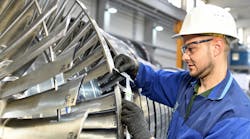 Industrial Worker Assembling A Turbine &copy; Industryviews Dreamstime