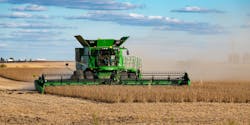 John Deere Combine Tractor Harvesting Soybeans &copy; Robert Philip Dreamstime
