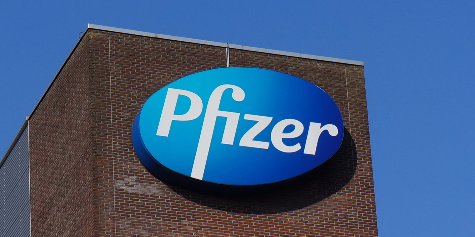 Pfizer Logo Blue Daniel127001 Dreamstime 5fb7fcb54b386