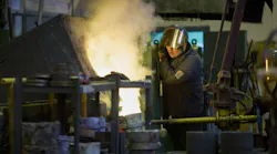 Man Pours Metal Into Molds At Steel Mill © Alexander Khitrov Dreamstime