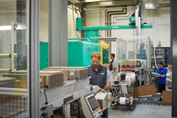 Metro Mold & Design’s work cells include high-speed automation, optimal tonnage injection molding machines, auxiliary equipment and cranes. (Credit: Metro Mold & Design) Metro Mold & Design’s work cells include high-speed automation, optimal tonnage injection molding machines, auxiliary equipment and cranes. (Credit: Metro Mold & Design)