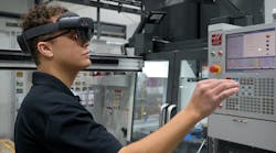 PBC Linear machine operator uses AR equipment to go through work instructions for a job on the Haas machining center. (Credit: PBC Linear)