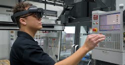 PBC Linear machine operator uses AR equipment to go through work instructions for a job on the Haas machining center. (Credit: PBC Linear) PBC Linear machine operator uses AR equipment to go through work instructions for a job on the Haas machining center. (Credit: PBC Linear)