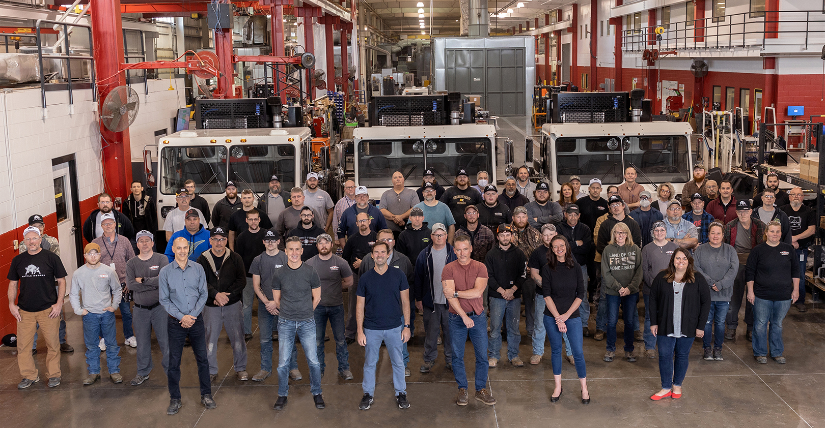 The Crane Carrier workforce gathers in the plant with new leadership.