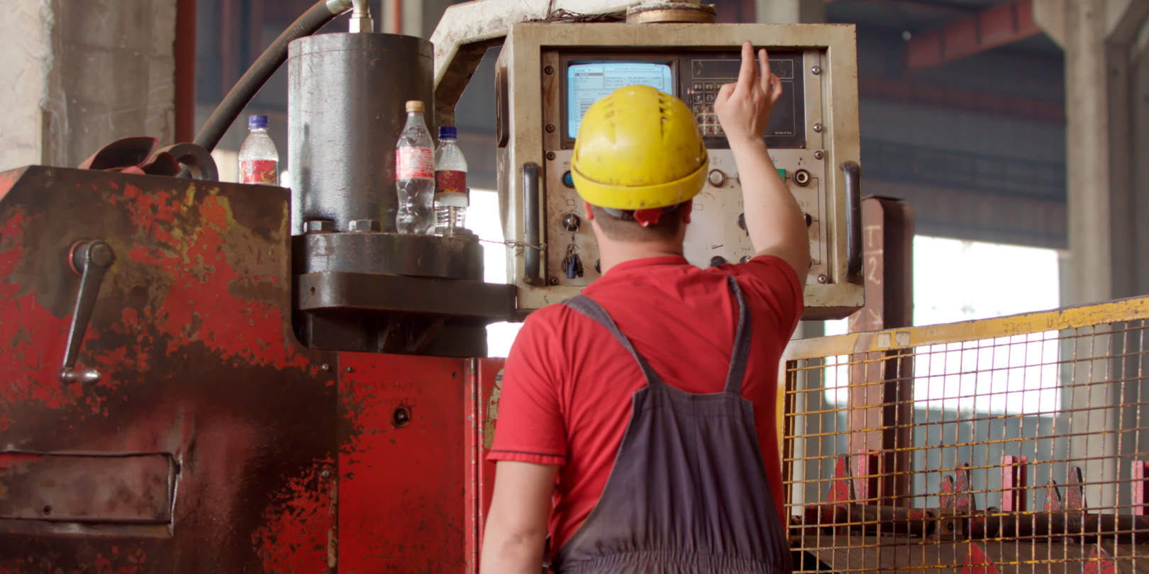 Employee In Helmet Operating Metal Process Machinery Serhii Shchehlov Dreamstime 60ba456055efc